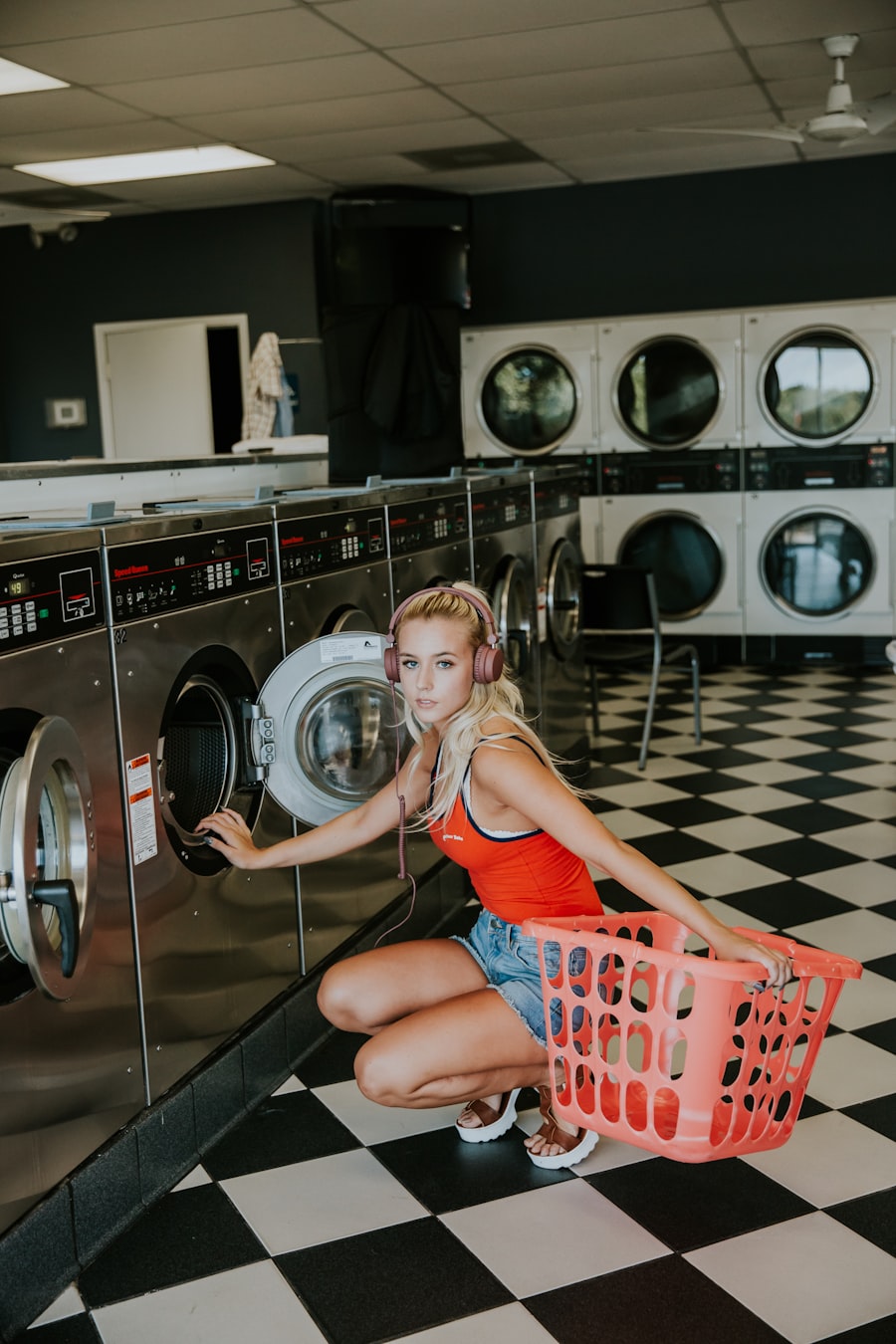 Customer at our clean self-service laundromat in Queens, NY